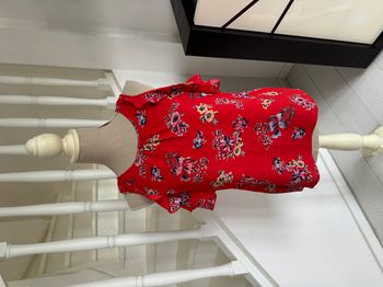 Blouse Primark rouge et fleurs multicolores