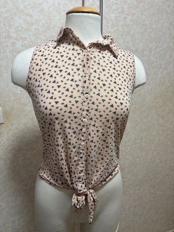 Chemise sans manche taille 34-36 marque kiabi