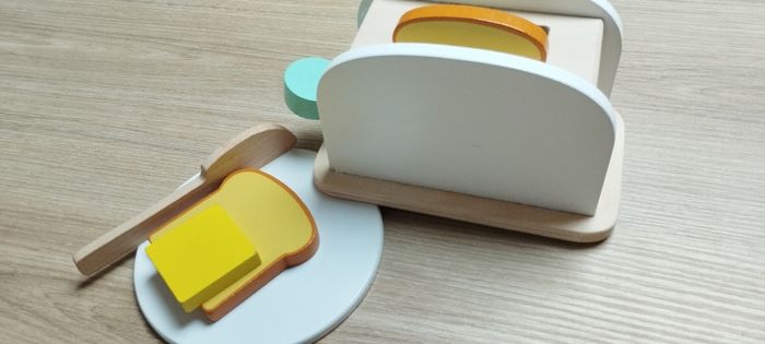 Grille pain jouet bois