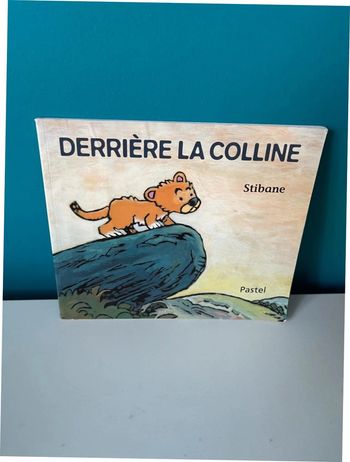 Livre école des loisirs derrière la colline