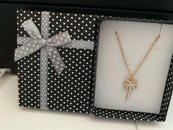 Collier doré  pendentif palmier avec brillant