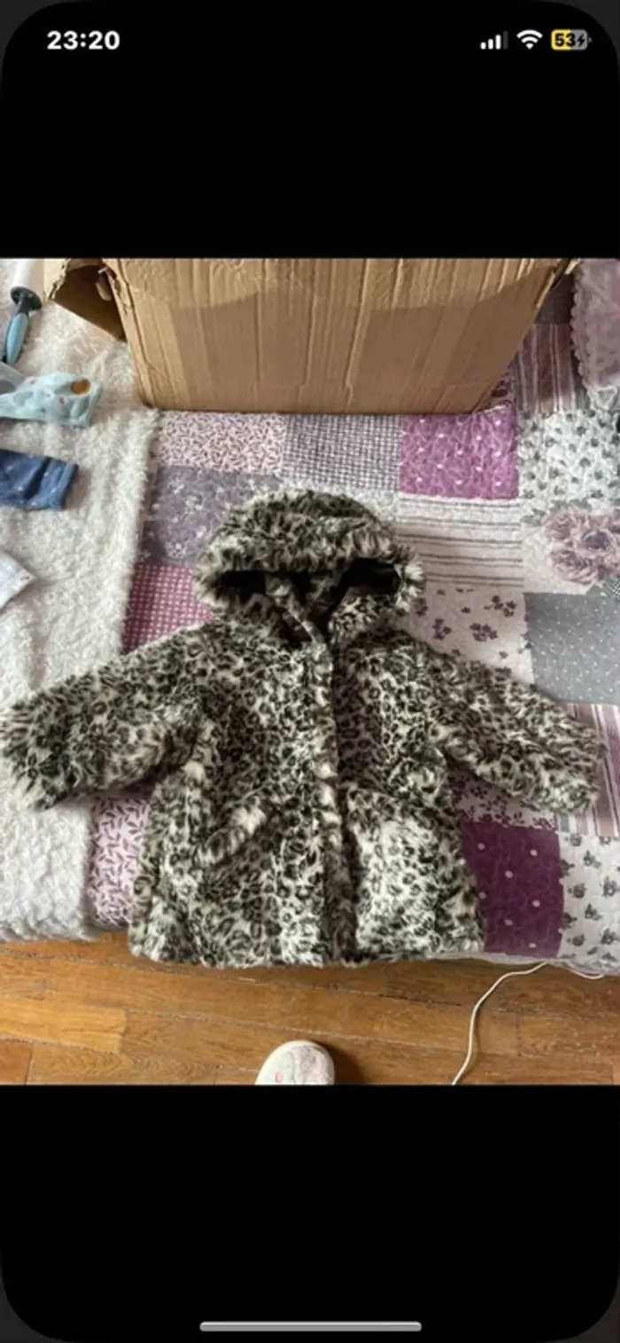 Manteau fausse fourrure léopard