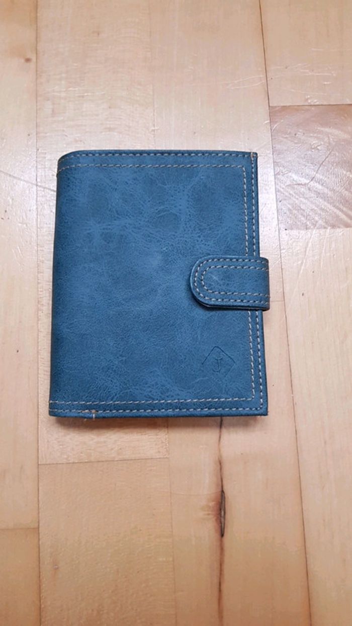 Joli porte monnaie bleu, neuf.