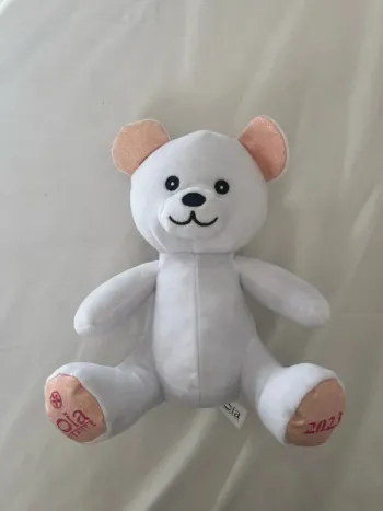 Peluche ours blanc