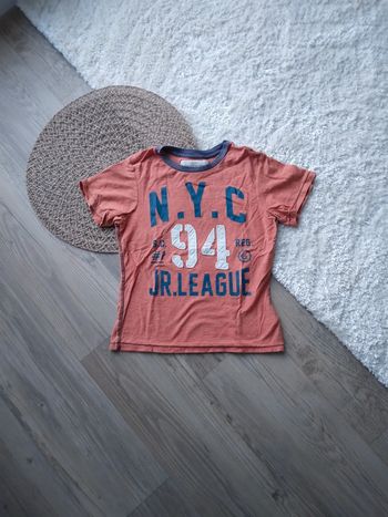 🌸Tee-shirt orange avec imprimé en relief 6ans a 1€🌸