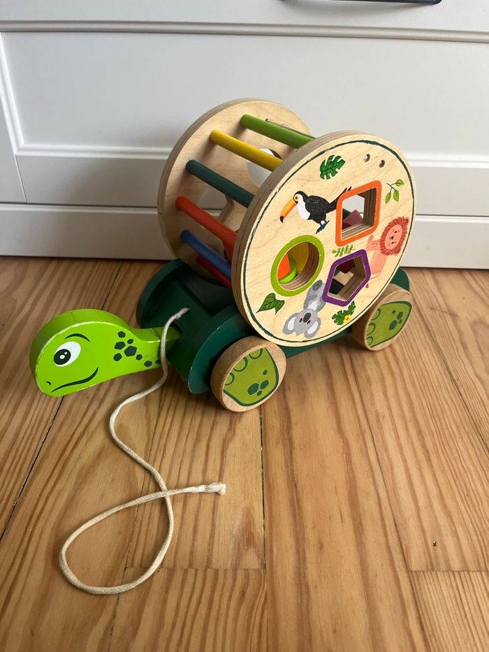 Tortue roulante avec jeu de motricité