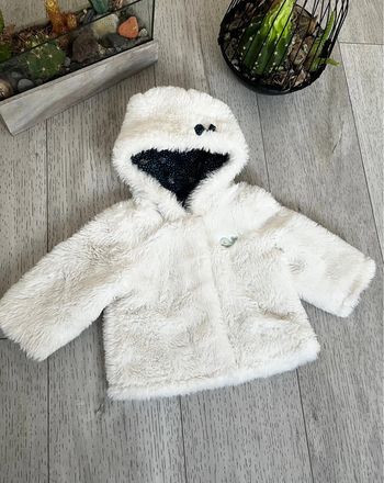 Veste fausse fourrure