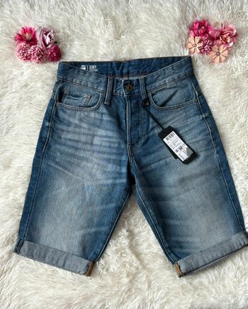 Short en jeans bleu avec fermeture à bouton de la marque G-star taille 24/34