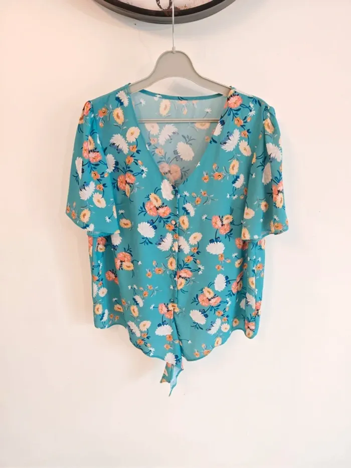 Chemisier bleu à fleurs taille 40