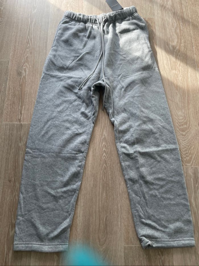 Pantalon survêtement avec poches sur le côté gris taille S neuf