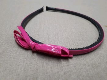 Serre tête rose et noir