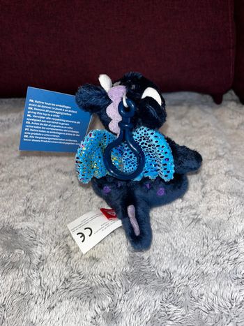 Peluche dragon neuve à paillettes