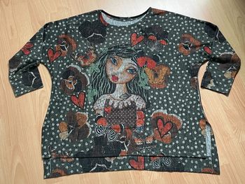 Haut à motifs avec détails en strass