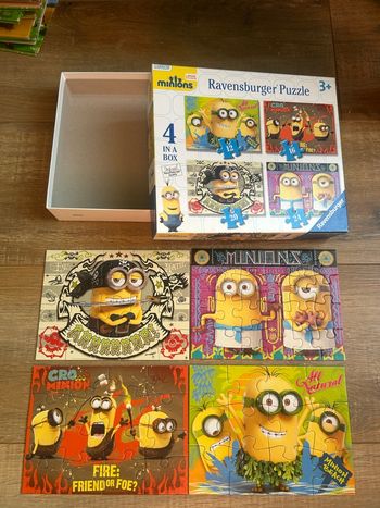Boîte de 4 puzzles les minions 