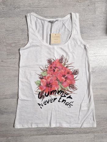Débardeur etam XS neuf avec étiquette blanc avec fleurs tropicales