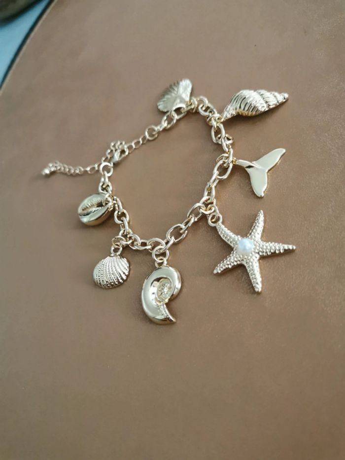 Bracelet tendance mer doré - photo numéro 2