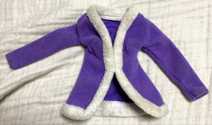 Veste violet moumoute  pour Barbie bon état