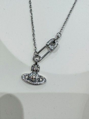 Collier vivienne westwood argenté neuf épingle 
