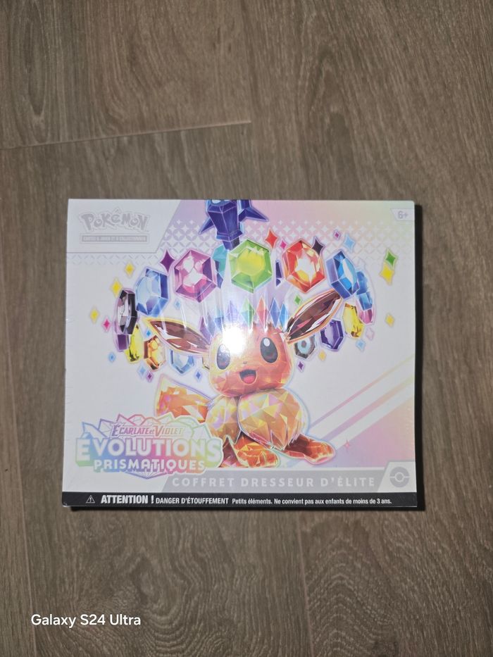 Pokemon coffret dresseur d'élite etb evolutions prismatiques 8.5 défaut de scellage