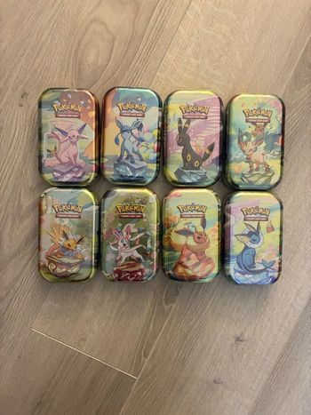 Lot de 8 mini tin Pokémon évolutions prismatiques Pokémon