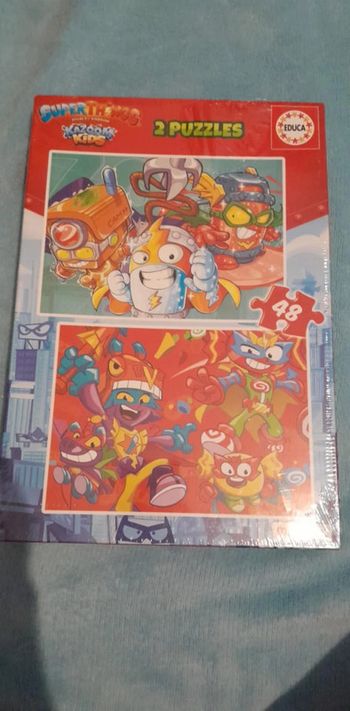 2 puzzle de 48 pieces chacun