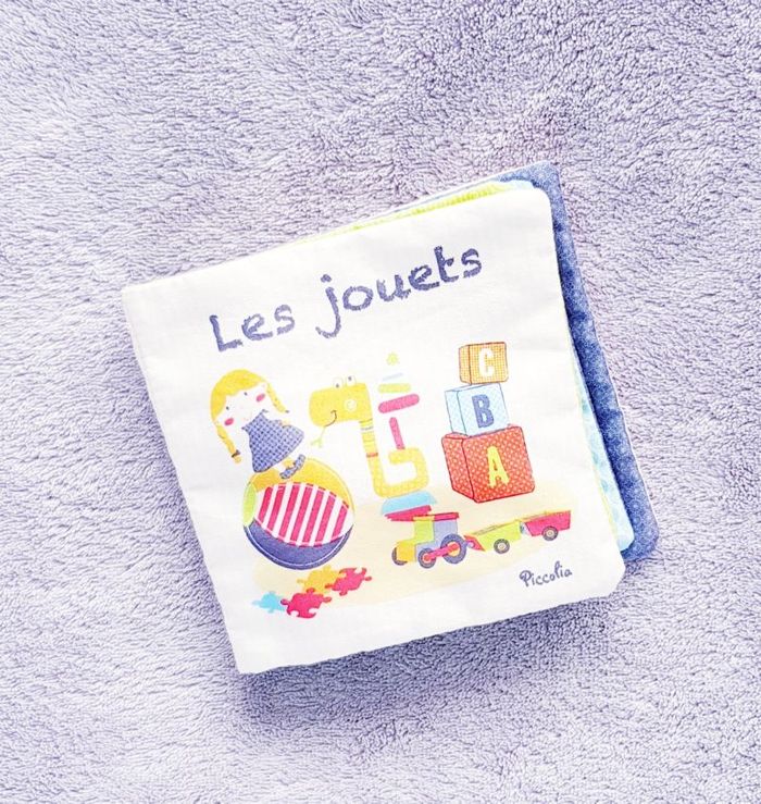 🦄 Livre en tissu "Les Jouets" - Piccolia - Neuf 🦄