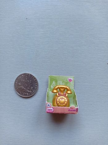 Mini téléphone or Minnie Disney store mini brands