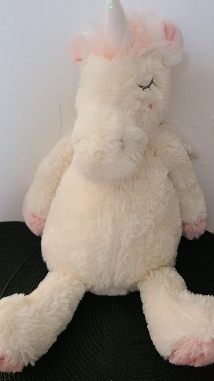 Peluche licorne ETAM range pyjama doudou bouillotte blanc rose