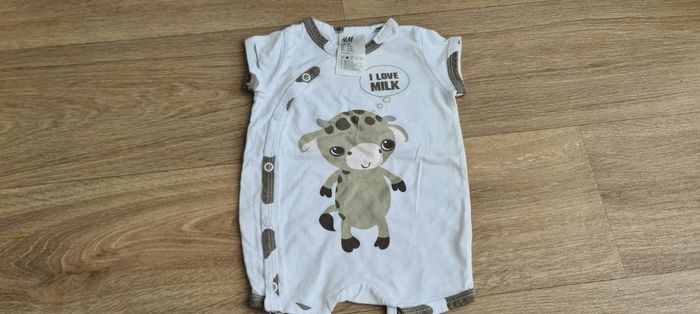 Adorable petite combinaison H&M taille 0/1 mois