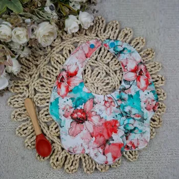 Bavoir forme fleur motif fleurs