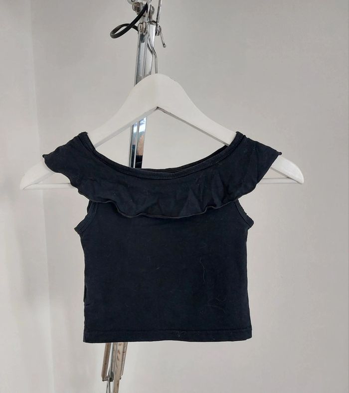 T-shirt noir sans manche bretelles froufrous 8 ans