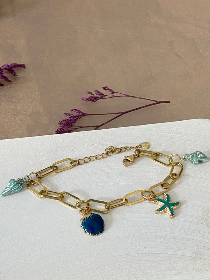 Bracelet en acier inoxydable avec pendentif style mer - photo numéro 1