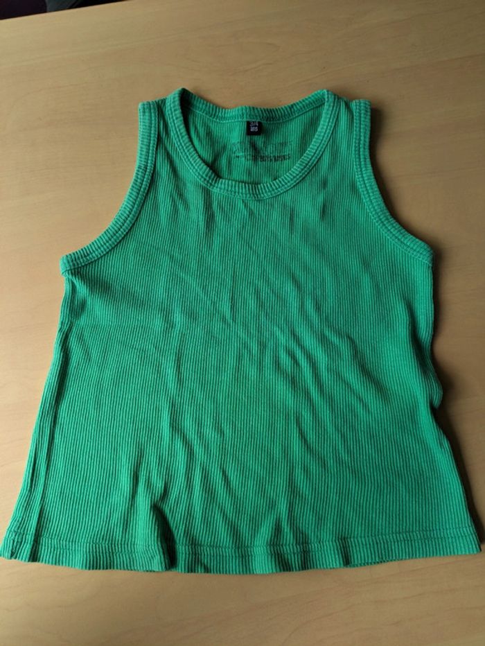 Tee shirt sans manche 3 4ans