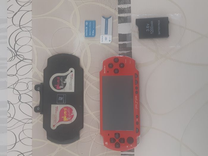 PSP Slim & Lite + Jeux + Films - photo numéro 5