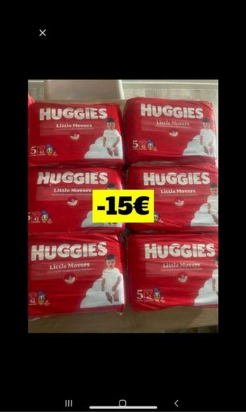 Six paquets de couches huggies taille 5