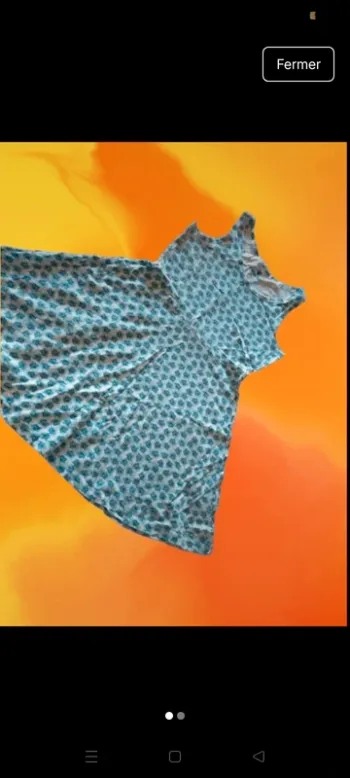 Robe imprimé  fleurs bleu et blanc taille 8-10 ans