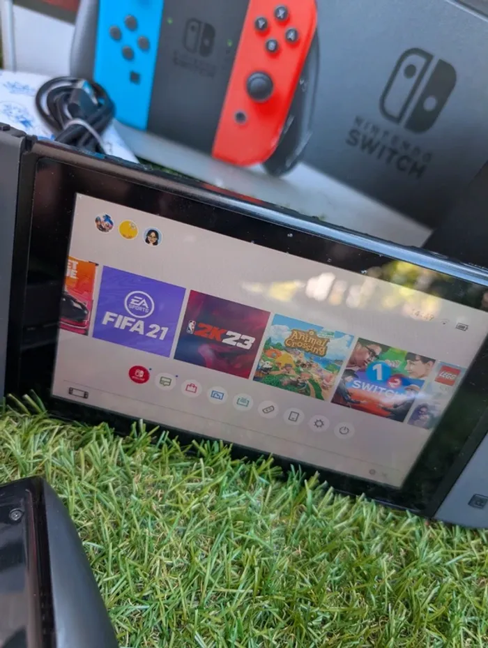 Console Nintendo Switch manettes carte SD pochette ect.. - photo numéro 14