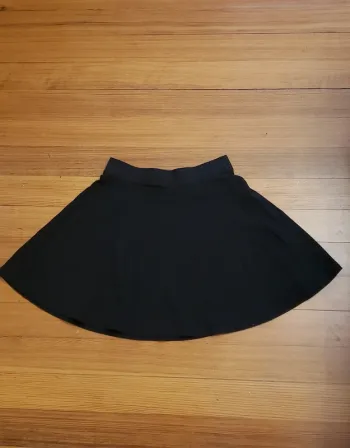 Mini jupe noir tissu souple élastique L