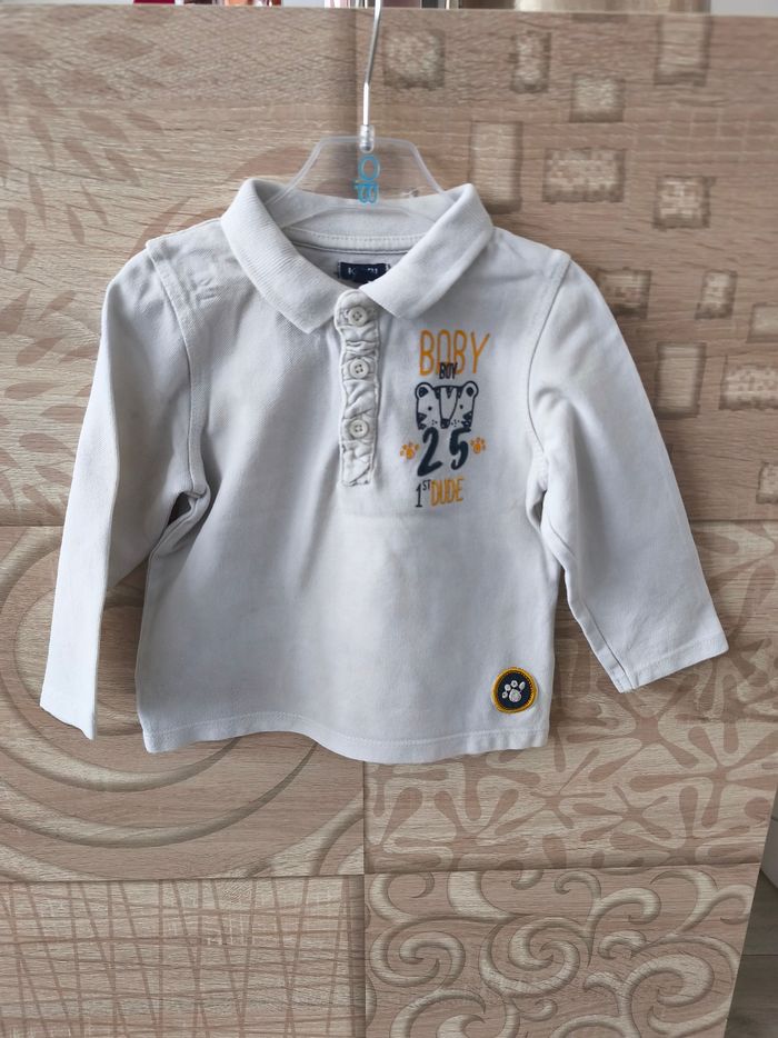 Polo blanc motif tigre