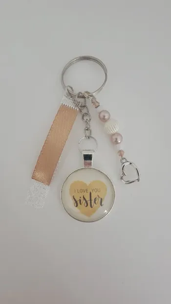 Porte clé message bijoux de sac " i love you sister"