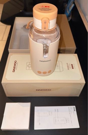 Chauffe eau lait biberon neuf jamais utilisé de marque DAEWOO (2 couleurs disponibles voir photos)