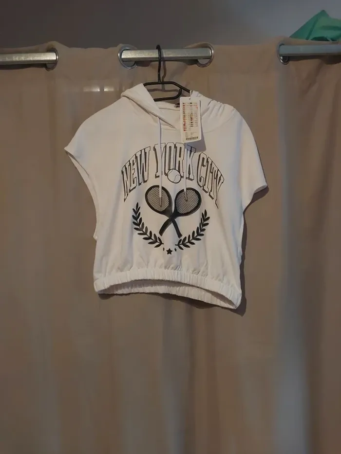 Sweat femme à capuche sans manche neuf