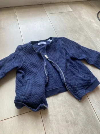 Veste bleue Okaïdi taille quatre ans