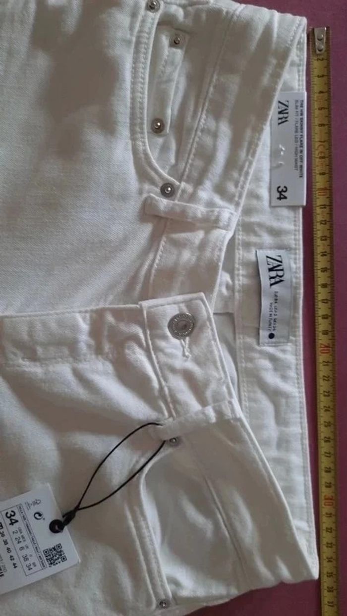 Jean blanc pattes d'éléphant Taille 34 - photo numéro 4