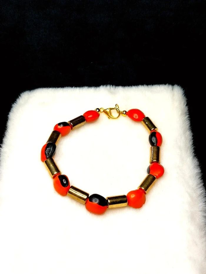 Magnifique bracelet en perles couleur doré et orange. - photo numéro 5