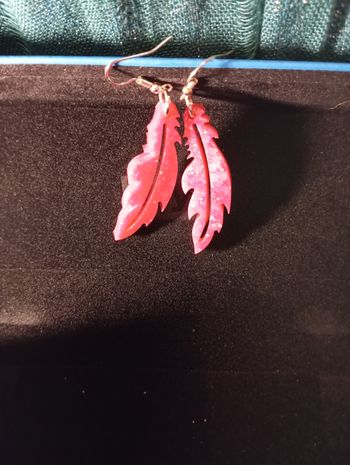 Boucles d'oreilles plumes rose