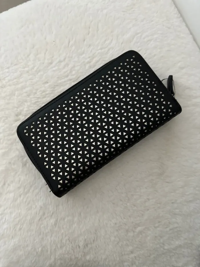 Portefeuille noir et doré