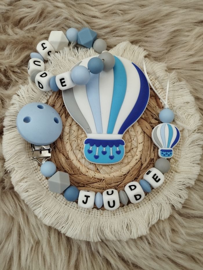 Attache tétine/ anneau de dentition