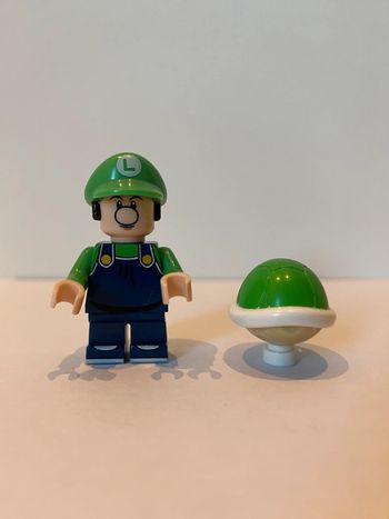 Figurine type lego Luigi. Super Mario