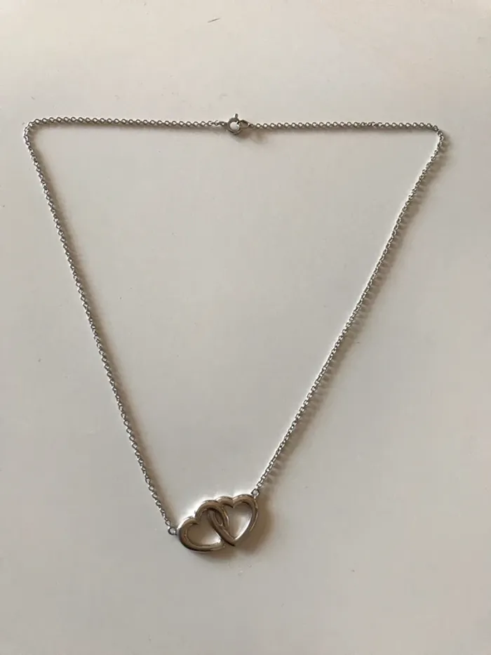 Collier en argent, cœur entre lacer - photo numéro 2